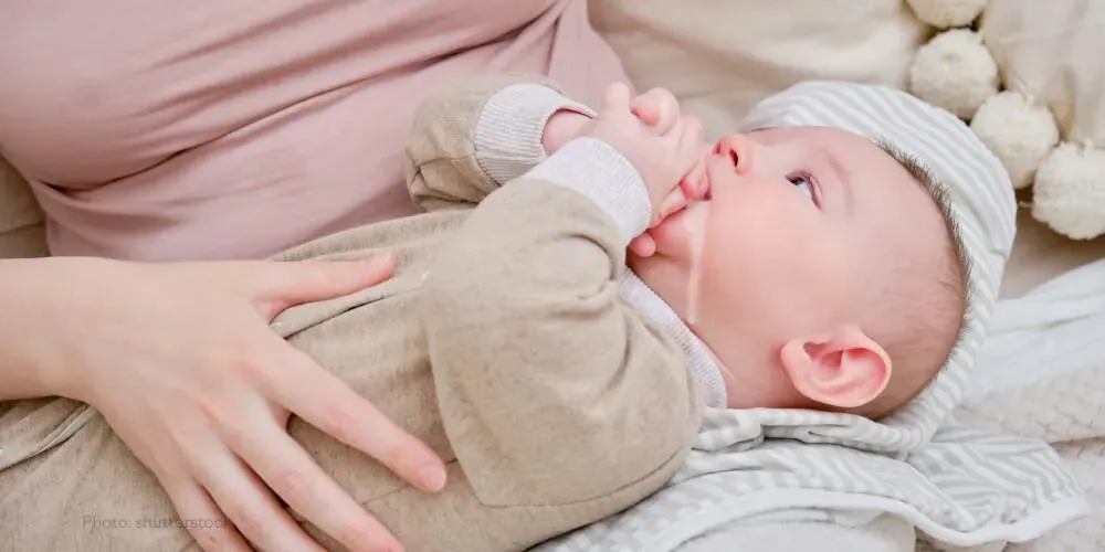 Is bloating and spitting up normal?